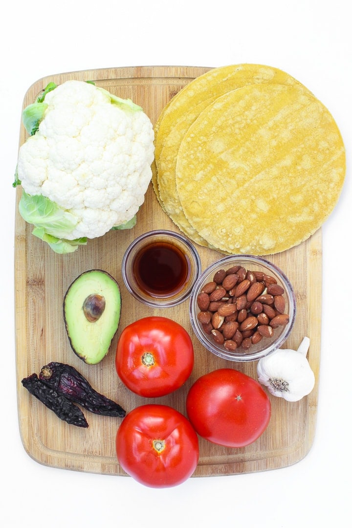  Cauliflower Tacos with Romesco Sauce ingredients on a cutting board