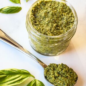 Pesto jar and spoon.