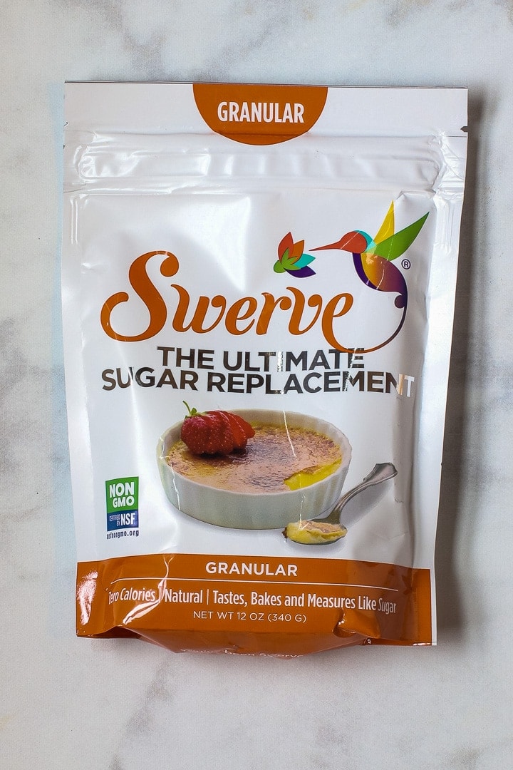 Package of Swerve brand sweetener on white marble.