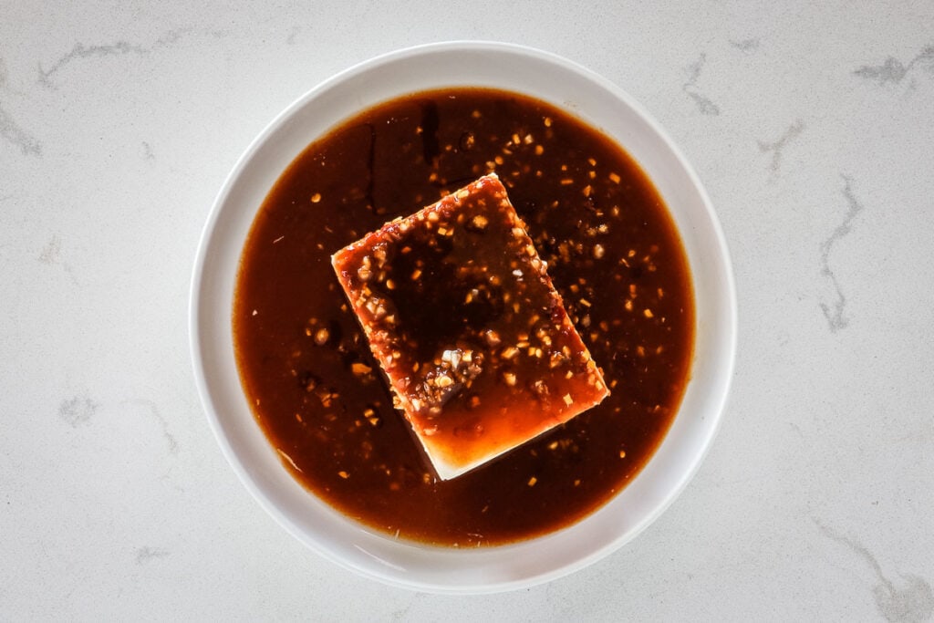 tofu and sauce in bowl.