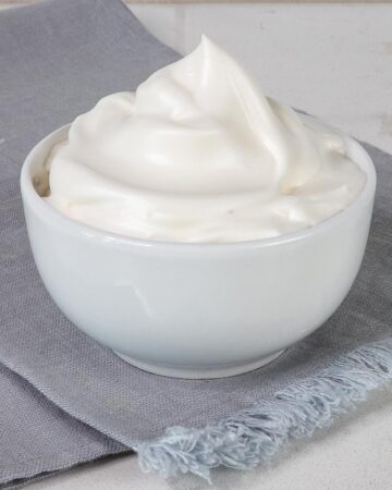 Close up bowl of aquafaba whipped cream.