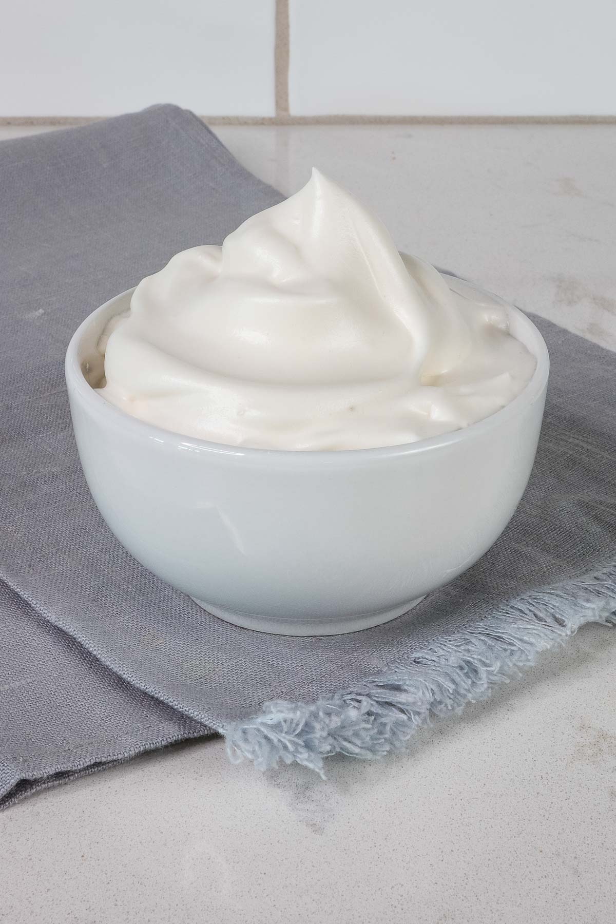 Close up bowl of whipped topping. 