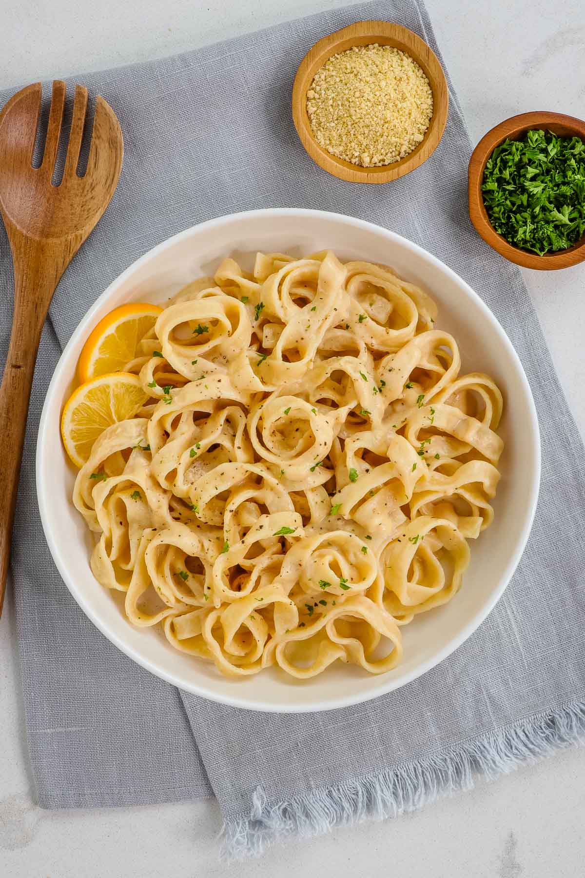 Vegan fettuccine alfredo in a pasta bowl. 